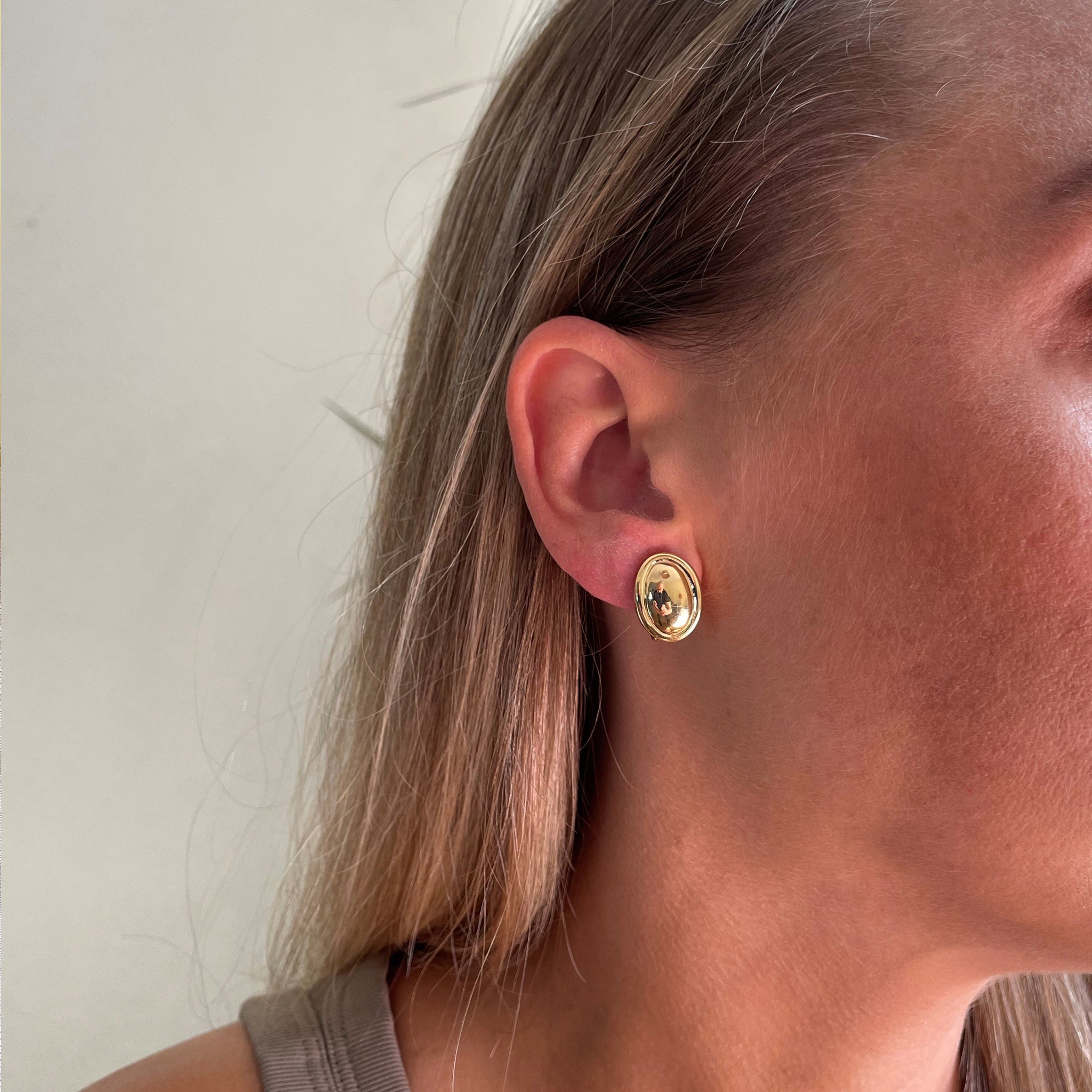 Vega Polished Gold Clip On Earrings